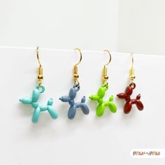 🎈🎉 Add a splash of whimsy to your look with our Colorful Mini Metal Balloon Dog Dangle Earrings! These little pop art pups are bursting with cuteness and ready to join your jewelry collection. Perfect for animal lovers and those who adore fun, unique accessories. Gift 'em to a friend or keep them all to yourself--either way, these fun-sized balloon dogs are here to make your day a little brighter!  Snag yours now and let's get the paw-ty started! 🌸✨ Specification ✨🌸 * 18k Gold Plated Earring Unique Accessories, Balloon Dog, Fun Sized, Earrings Cute, Stunning Earrings, Accessories Unique, Charm Earrings, Jewelry Earrings Dangle, Pop Art