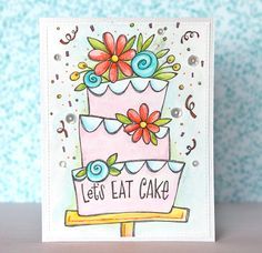 a handmade card with a cake and flowers on the top that says let's eat cake