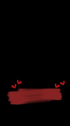 a black background with some red hearts on it