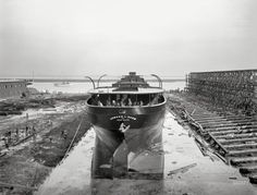 a large boat sitting on top of a dry dock