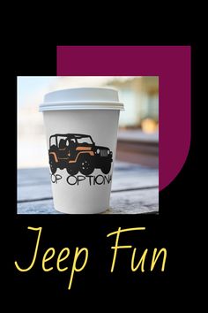 a coffee cup sitting on top of a table next to a sign that says jeep fun