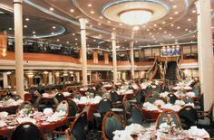 a large dining room filled with lots of tables and chairs