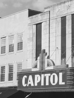 a black and white photo of the capitol theater