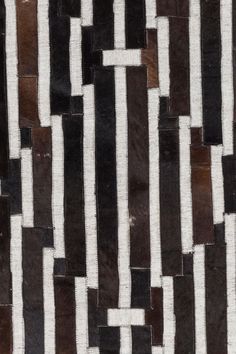 a black and white area rug with stripes on it