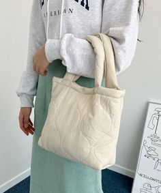 Handy Quilted Padding Sherpa inner-lining Tote Bag Size One size Length 22cm  Wide 22cm Fabric and Care  Polyester 100%  Hand washing and line dry recommend  Made in S Korea Casual Cream Bags For Winter, Casual Cream Winter Bags, Casual Quilted Beige Shoulder Bag, Casual Beige Quilted Shoulder Bag, Winter Tote, Village Women, Button Collar Shirt, Quilt Bag, Quilted Bags