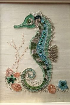 the seahorse is made out of beads and other beadwork materials, including pearls