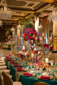 the table is set with many glasses and place settings