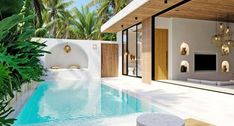 an outdoor swimming pool surrounded by palm trees and water features a spa like area with built - in jacuzzi tubs