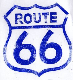 a blue and white sign that says route 66