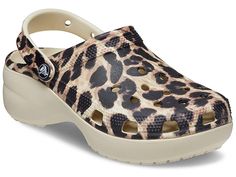 Crocs Classic Platform Clog - Women's Shoes : Bone/Leopard Animal Remix : To continue their support for the LGBTQ community, Crocs is donating to GLAAD, the leading media advocacy organization working to accelerate LGBTQ acceptance. When you're in the mood for a little extra boost, style it up with the Crocs Classic Platform Marbled Tie-Dye Clog with their most generous, roomy fit. This style-relevant version of their Classic icon features a heightened, contoured outsole that supports the upper Lgbtq Acceptance, Crocs Platform, Classic Icon, High Heel Sandals Platform, Crocs Clog, Crocs Clogs, Platform Clogs, Women's Clogs, Women's Crocs