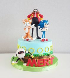 an image of a cake with cartoon characters on it