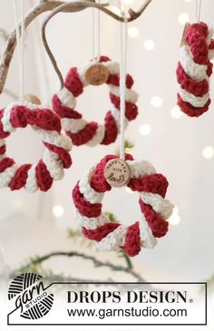 crocheted christmas ornaments hanging from a tree