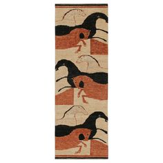 a long rug with horses on it