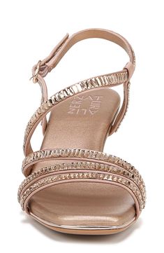 Jewel-encrusted vamp straps add contemporary elegance to an occasion-ready sandal set on a cushioned footbed and sculpted flare heel. 2 1/4" heel Adjustable slingback strap with buckle closure Cushioned footbed with Contour+ technology Textile upper/synthetic lining and sole Imported Gold Synthetic Elegant Slingback Sandals, Elegant Gold Synthetic Slingback Sandals, Glamorous Rose Gold Sandals For Formal Occasions, Glamorous Rose Gold Evening Sandals, Elegant Rose Gold Sandals For Evening, Spring Rose Gold Sandals For Formal Occasions, Chic Rose Gold Evening Sandals, Formal Rose Gold Sandals For Spring, Spring Formal Rose Gold Sandals