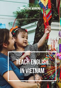 a woman holding a small child in her arms with the caption teach english in vietnam