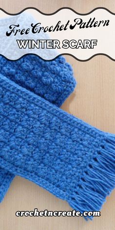 a pair of blue knitted mitts sitting on top of a wooden table with text overlay that says free crochet pattern winter scarf