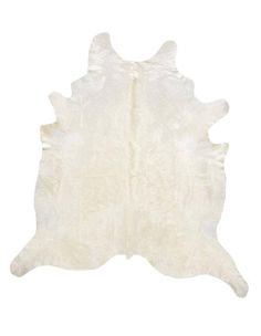 a white cowhide rug on a white background with no one in the photo looking at it