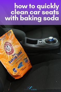 a bag of baking soda sitting in the center console of a car with text overlay reading how to quickly clean car seats with baking soda