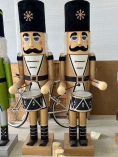 two nutcrackers are standing next to each other