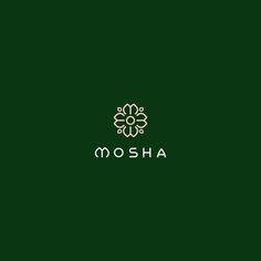 the mosha logo is shown on a dark green background with white letters and a gold flower