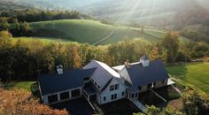 an aerial view of a house in the countryside