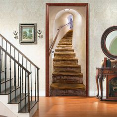 an open door leading to a stairway with wooden steps and mirror on the wall next to it