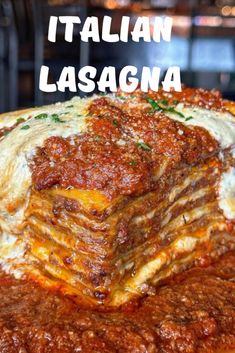 a stack of lasagna stacked on top of each other with the words italian lasagna above it