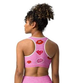 ABOUT Get ready to pucker up in this Valentine's Day-inspired sports bra! With a playful kiss print and comfortable fit, this bra will keep you supported and stylish during your workouts. Show off your fun and flirty side while staying active. (No puckering required!) Crafted with a breathable mesh fabric and unique cut-out design, this bra ensures maximum ventilation and comfort. The supportive straps and ribbed band provide added strength and stability, allowing you to reach your workout goals Kiss Print, Playful Kiss, Workout Goals, Staying Active, Padded Sports Bra, Cut Out Design, Mesh Fabric, Show Off, Get Ready