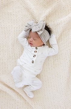 Your bundle of joy will look even sweeter in this soft and stretchy headband styled with an oversized bow detail. Includes two assorted headbands 5" x 4" bow Nylon/spandex Hand wash, dry flat Made in the USA Kids' Wear Newborn Photoshoot Headband, Infant Headband Bow, Baby Clothes Country, Newborn Bows, Baby Bling, Bow Headbands, Stretchy Headbands