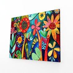 a painting on the wall with flowers painted on it