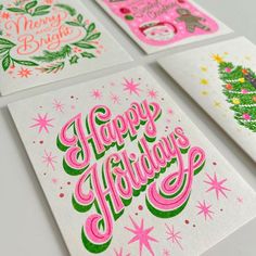 four christmas cards with the words happy holidays written in pink, green and orange on them