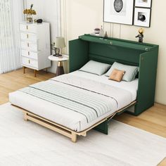 a bed that is sitting in the middle of a room next to a white rug