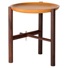 a small wooden table with two legs and a round tray on the top that has a cross section at the bottom