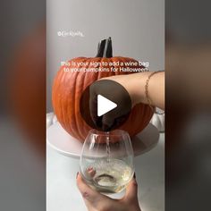 someone is pouring wine into a glass for halloween