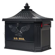 the mailbox is black and has an eagle on it