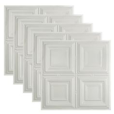 six white square tiles on a white background