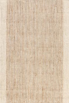 a beige rug with vertical stripes on the bottom, and a white border at the top