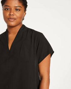 Better-Than-Silk V-Neck Top - Black | Universal Standard Stretch Rayon V-neck Blouse, Black V-neck Rayon Blouse, Black Split Neck Top For Workwear, Versatile V-neck Viscose Blouse, Modern Solid Color V-neck Tops, Stretch V-neck Top For Work, Sleek Solid Color V-neck Top, Sleek Solid V-neck Top, Sleek Solid V-neck Blouse