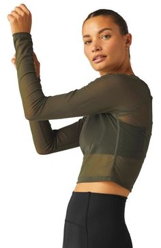 "Find BEYOND YOGA Show Off Sheer Mesh Crop Top on Editorialist. Give your next athletic look a stylish finish with this superstretchy mesh crop top that's great from morning jobs to post-workout cool-downs. 18\" length (size Medium) Crewneck Long sleeves Sheer 93% polyester, 7% elastane Machine wash, dry flat Made in the USA of imported fabric" Athletic Looks, Mesh Crop Top, Beyond Yoga, Post Workout, Show Off, Crop Top, Long Sleeves, Mesh, Yoga