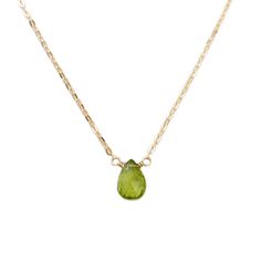 The dainty peridot necklace is perfect for anyone with an August birthday. Peridot has been prized throughout history for its protective powers and the ability to help one recognize their own destiny and purpose. These gemstones are an olive-green color, and crafted with care onto your choice of 14k gold, gold fill or sterling silver chain.DETAILS- Genuine Peridot- Peridot size: approximately 9 mm by 6 mm- Made in gold filled, sterling silver or 14k solid gold- Adjustable chain 14" - 16", 16" - Green Peridot Necklace For May Birthstone, Peridot Gemstone Beads Necklace As Gift, Green Peridot Jewelry With Gemstone Beads, Peridot Gemstone Necklace For May Birthstone, Peridot Gemstone Beads Necklace For Gift, Peridot Gemstone Bead Necklace For Gift, Green Peridot Gemstone Beads Jewelry, Lime Green Peridot Necklace For May Birthstone, Peridot Faceted Jewelry For May Birthstone