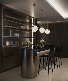 a modern bar with stools and lights hanging from it's ceiling in a dark colored room