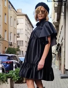 A puff sleeve taffeta dress in black is a perfect dress for everyone.  This black babydoll dress is the perfect black dress for every occasion.  You can dress this up with some booties or heels or dress it down with some cute sneakers.  The perfect mix of comfort and extravagance, this black dress/shirt is all you need in the hot weather. https://www.etsy.com/shop/RenatteShop * Size Chart The item from the picture is size S. XS (US 2, UK 6) Bust: around 33.5" / 85 cm Waist: around 26" / 66 cm Hips: around 36" / 91 cm Height: 5'3" / 160 cm S (US 6, UK 10) Bust: fits Bust around 35.5" / 90 cm Waist: fits waist around 28"/ 71 cm Hips: fits hips around 38"/ 97 cm Height: 5'5" / 165 cm M (US 10, UK 14) Bust: around 37.5" / 95 cm Waist: around 30"/ 76 cm Hips: around 40"/ 102 cm Height: 5'6" / 1 Evening Puff Sleeve Satin Dress With Ruffles, Satin Ruffle Puff Sleeve Dress, Black Taffeta Dress For Evening, Black Taffeta Evening Dress, Black A-line Puff Sleeve Evening Dress, Black Satin Dress For Fall, Fall Black Satin Dresses, Black Satin Short Sleeve Dress, Elegant Black Bubble Dress For Party