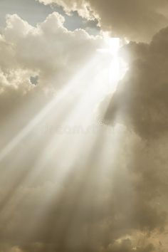 the sun shines through clouds on a cloudy day royalty images and stock photos for sale