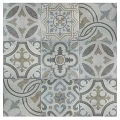 an artistic tile design with grey and white tiles on the floor, in different colors