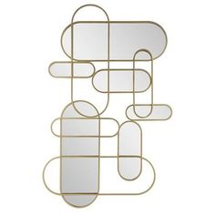 an abstract metal wall sculpture with circles and oval shapes on the top, in gold