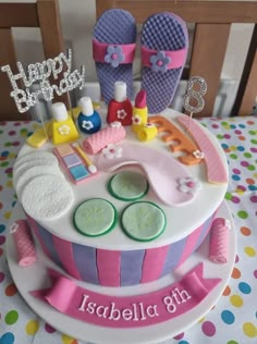 a birthday cake decorated with shoes and accessories