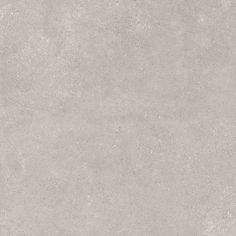 a gray concrete wall textured with light grey paint