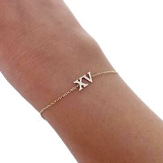 Roman numeral bracelets made out of solid 14kt gold, perfect gift for many heartwarming moments to remember in your life! The bracelet with a date is a perfect gift for: *Anniversary. *Birth (of the child) *Wedding date. *Sweet 16. *Valentine's  *Mother's day *Christmas. *Your first achievement. *Date that keep you happy. *Dates that signify your. happiness. (May god give you many). *Date as a happiness trigger.. NUMERAL size Chain 14 to 18 inches. One numeral size is 5mm. Color: .White .Yellow Date Bracelet, Roman Numeral Bracelet, Number Jewelry, Jersey Numbers, Gift For Anniversary, Bracelet Wedding, Pompano Beach, Roman Numeral, Letter Charms