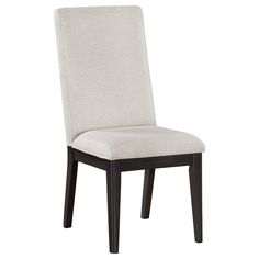 a white upholstered chair with dark wood legs and a beige fabric seat cover