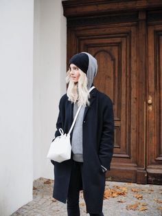 Cos beanie, The Kooples coat, Acne Studios cashmere hoodie, Mansur Gavriel bucket bag. Via Mija Beanie Outfit, Cashmere Hoodie, Cozy Knit, Coat Outfits, Outfit Casual, Outfit Idea, Black Coat, Minimalist Fashion